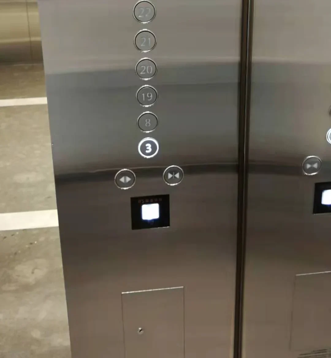Slim QR code reader installed for elevator access